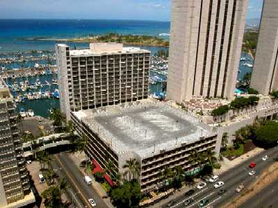 Ilikai Marina, Parking Lot & Building from Discovery Bay, Honolulu, Hawaii condominium sales